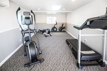 Fitness center with cardio equipment at Stone Creek, Redwood City, CA